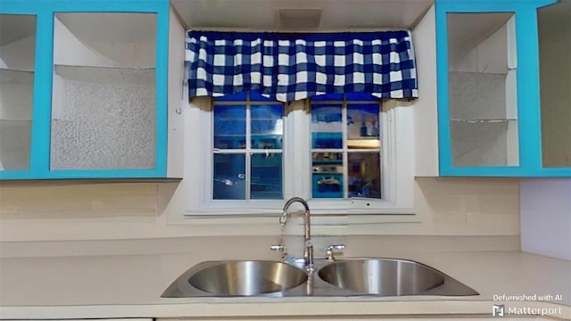 kitchen with sink and tasteful backsplash