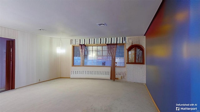 empty room featuring radiator heating unit