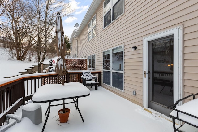 view of snow covered deck