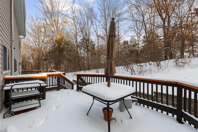 view of snow covered deck