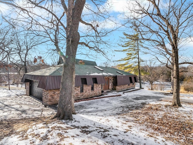 view of snow covered property