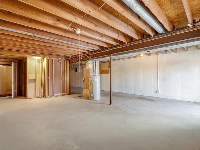 basement featuring electric water heater