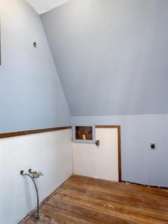 washroom featuring hardwood / wood-style flooring, hookup for an electric dryer, and washer hookup