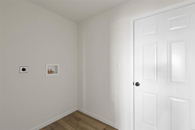 laundry room featuring hookup for an electric dryer, hookup for a washing machine, and dark hardwood / wood-style floors