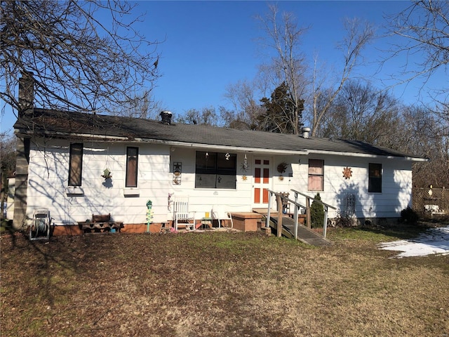 single story home with a front yard