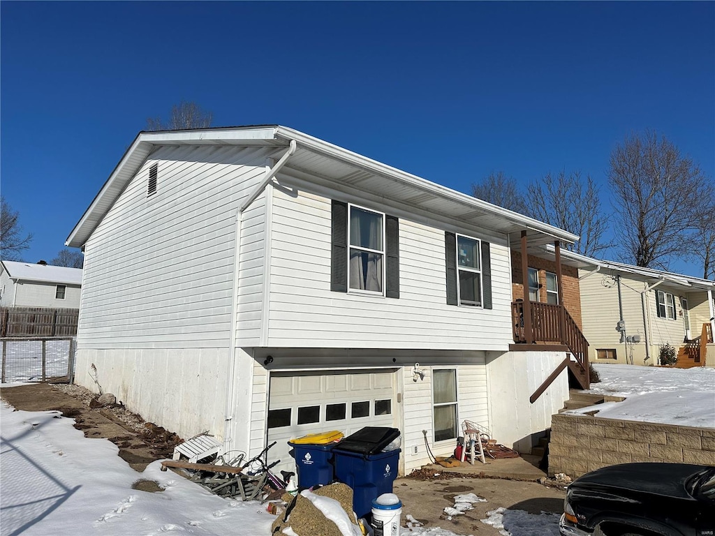 exterior space with a garage