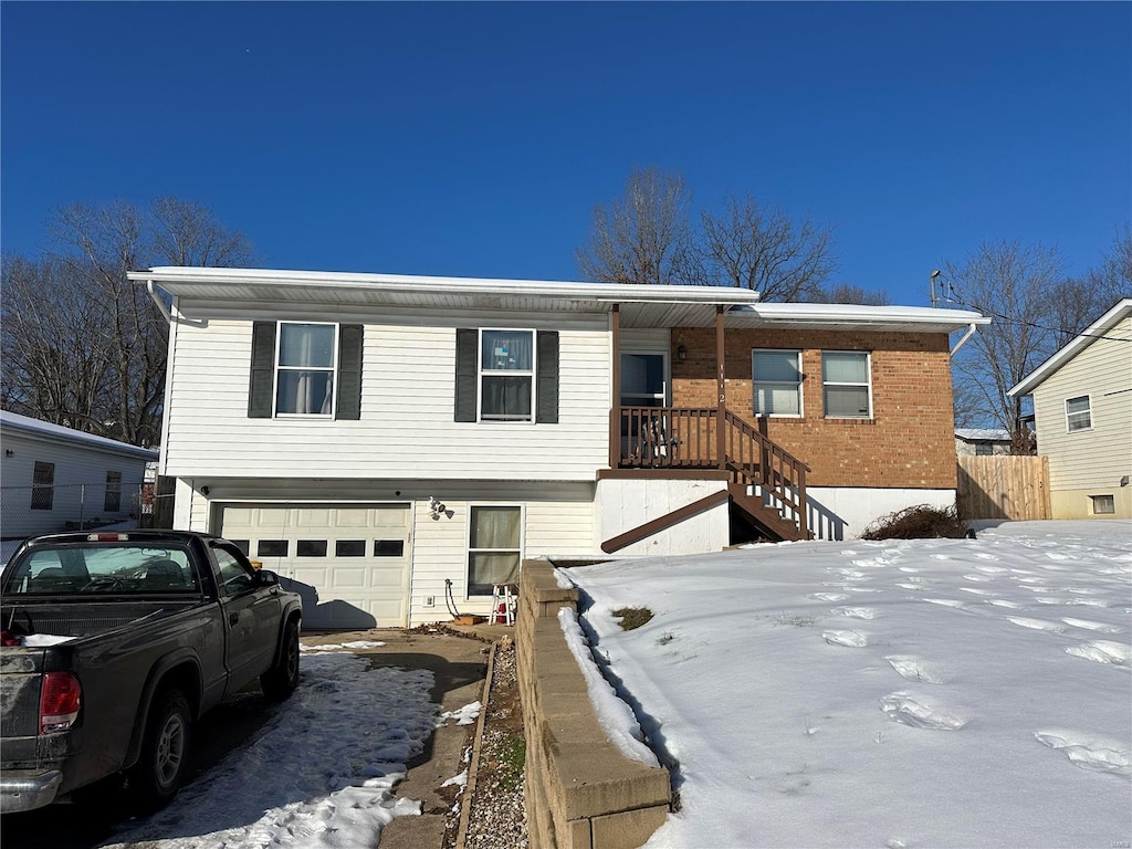 view of front of home with a garage