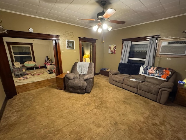 living room with ornamental molding, ceiling fan, carpet floors, and an AC wall unit