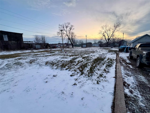 view of yard covered in snow