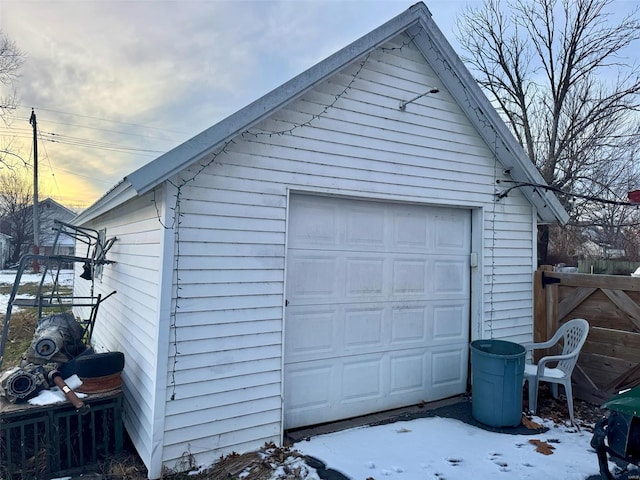 view of snow covered garage