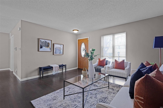 living room featuring a textured ceiling and dark wood-type flooring