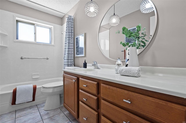 full bathroom featuring a textured ceiling, tile patterned flooring, vanity, toilet, and  shower combination