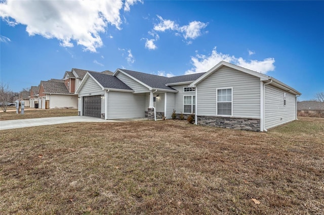 view of front of home with a garage and a front lawn