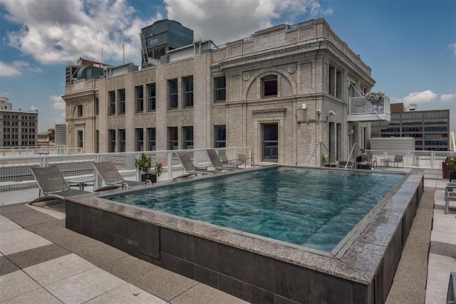 view of pool with a patio area