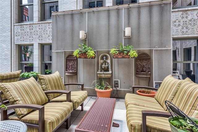 balcony featuring an outdoor hangout area and a patio area