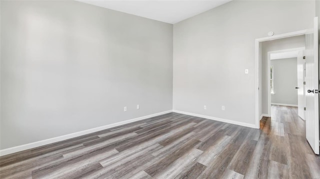 empty room featuring hardwood / wood-style flooring