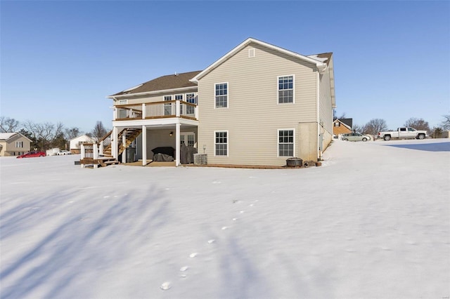 view of snow covered house