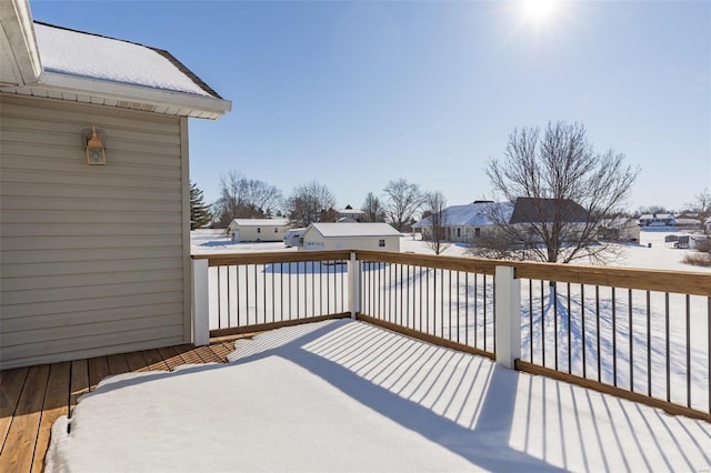 view of snow covered deck