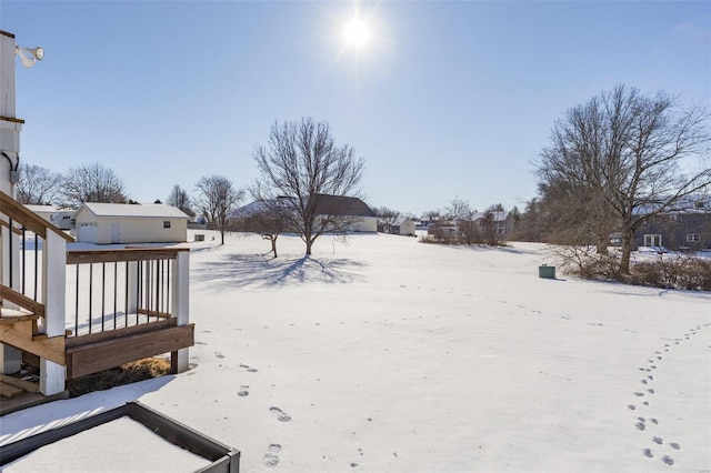 view of yard covered in snow