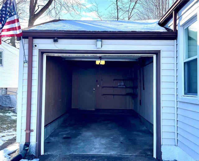 view of snow covered garage