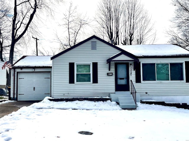 single story home featuring a garage