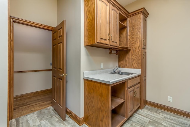 kitchen featuring sink and light hardwood / wood-style flooring