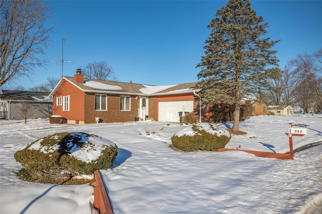 single story home featuring a garage