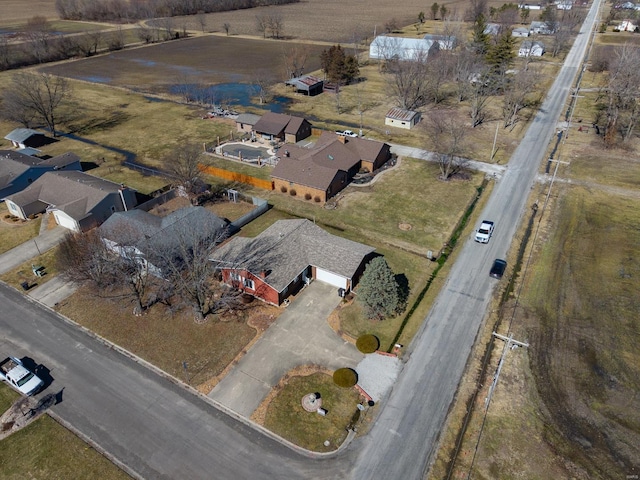 birds eye view of property featuring a rural view