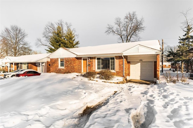 single story home featuring a garage