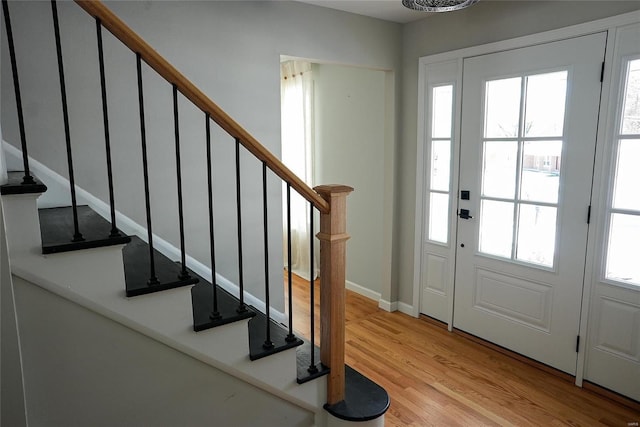 foyer with light hardwood / wood-style flooring