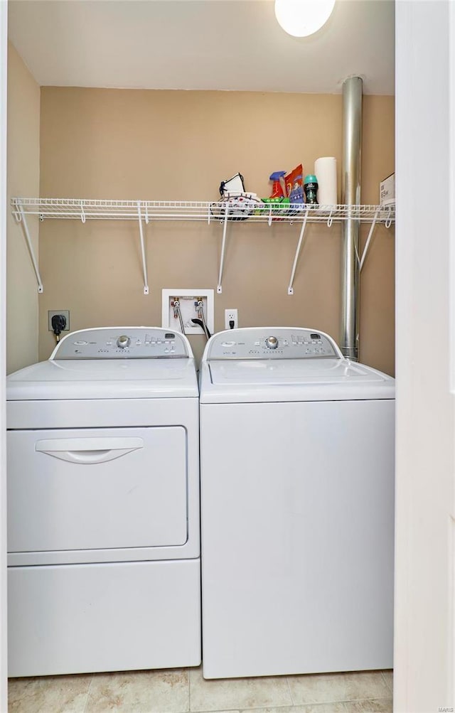 laundry area featuring separate washer and dryer