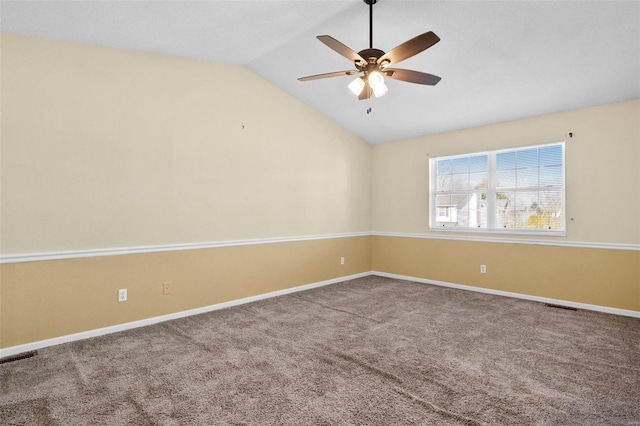 unfurnished room featuring ceiling fan, lofted ceiling, and carpet floors