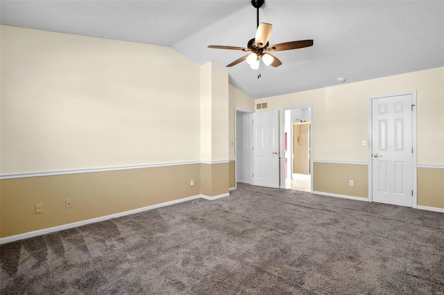 unfurnished bedroom with ceiling fan, carpet floors, and vaulted ceiling