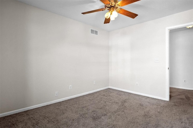 unfurnished room with ceiling fan and carpet floors