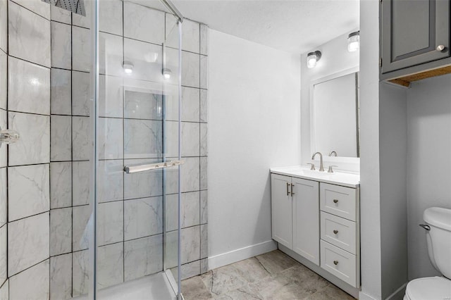 bathroom with toilet, a textured ceiling, an enclosed shower, and vanity