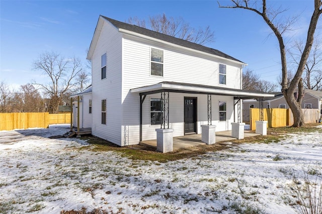 view of front of property featuring covered porch