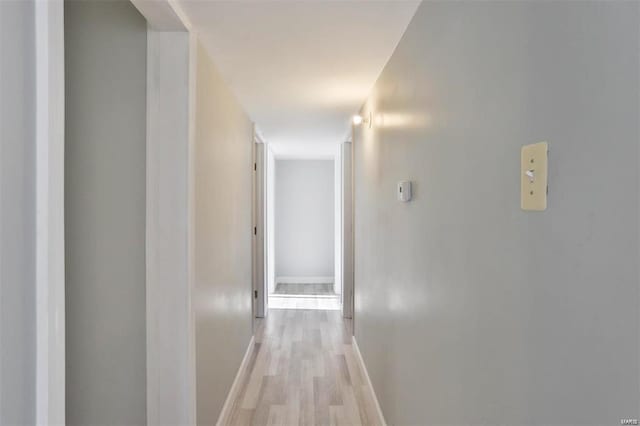 hallway featuring light hardwood / wood-style floors