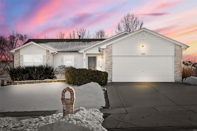 ranch-style home with a garage