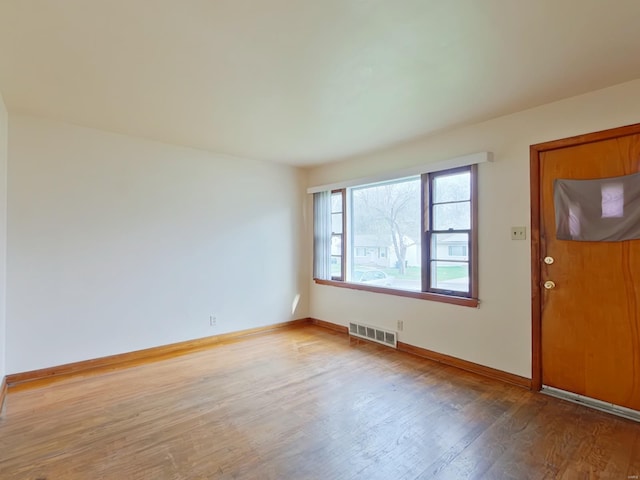 foyer entrance with light wood-type flooring