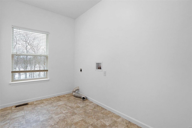 washroom featuring a wealth of natural light, hookup for a washing machine, and hookup for an electric dryer