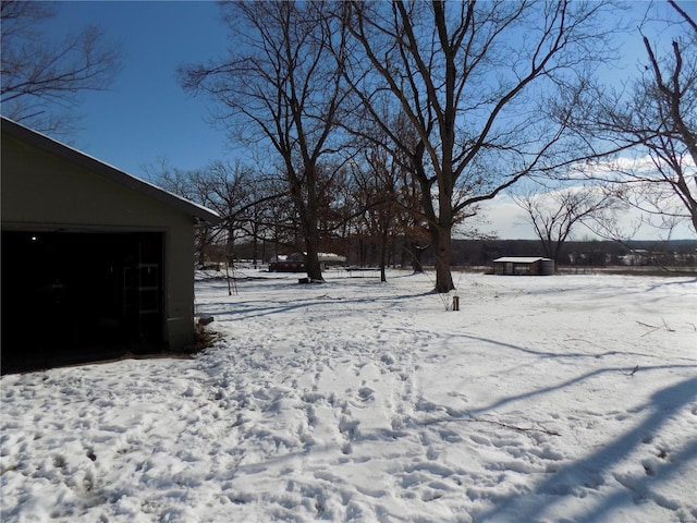 view of yard covered in snow