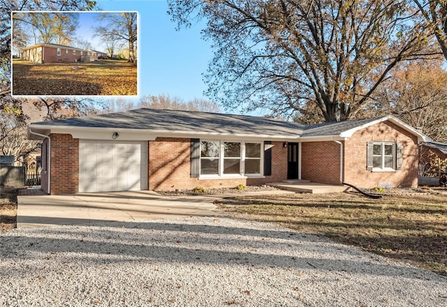 single story home with a garage