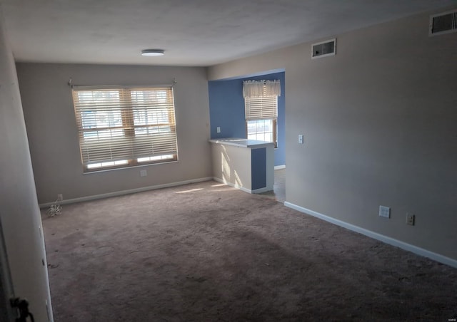 view of carpeted spare room