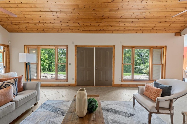 tiled living room featuring wood ceiling and vaulted ceiling