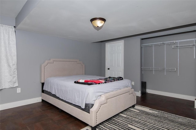 bedroom featuring dark hardwood / wood-style flooring