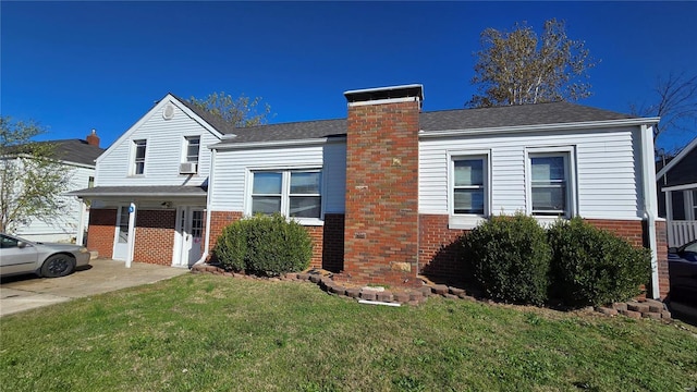 view of front of home with a front yard