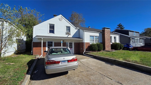 view of front of home with a front yard