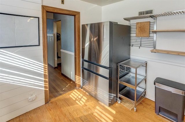 staircase featuring hardwood / wood-style flooring