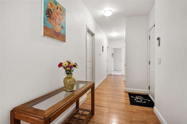 hallway featuring light hardwood / wood-style flooring