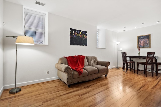 living room with light hardwood / wood-style floors